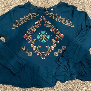 Peplum patterned top